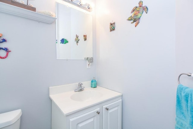 41 Oak St Unit 2, Waltham, MA 02453 - half bathroom featuring vanity and toilet