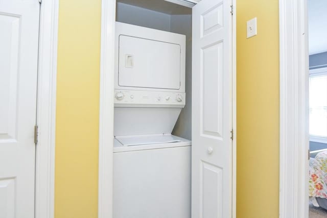 41 Oak St Unit 2, Waltham, MA 02453 - laundry room featuring stacked washer / drying machine