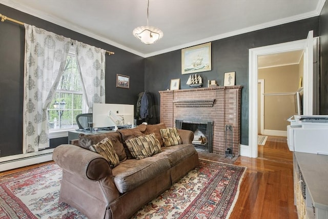 121 Main St, Medway, MA 02053 - living area featuring wood finished floors, ornamental molding, a brick fireplace, baseboards, and a baseboard heating unit