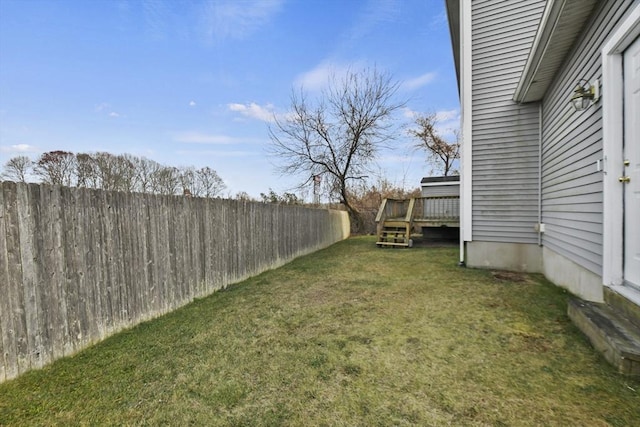 view of yard with a deck