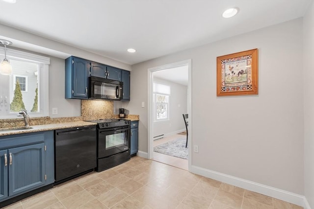 kitchen with blue cabinets, black appliances, a sink, recessed lighting, and baseboards