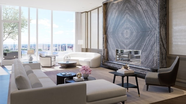 living room featuring hardwood / wood-style flooring and a wall of windows