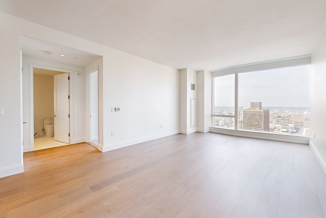 empty room featuring light hardwood / wood-style floors