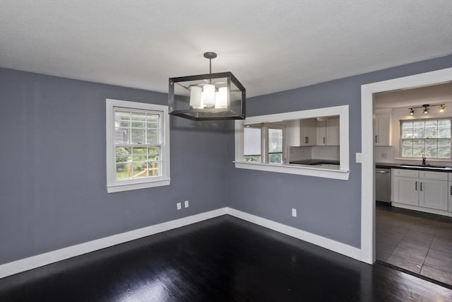 7 Summit Dr, Westfield, MA 01085 - unfurnished dining area featuring a sink and dark wood-style flooring