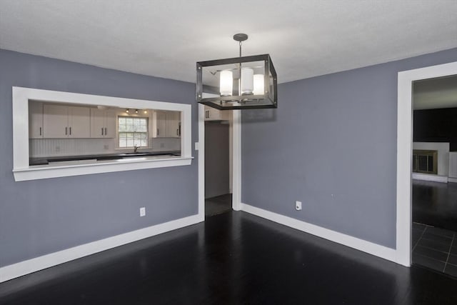 7 Summit Dr, Westfield, MA 01085 - unfurnished dining area featuring a chandelier and dark wood-type flooring