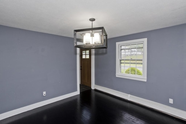 7 Summit Dr, Westfield, MA 01085 - spare room featuring a chandelier and wood finished floors