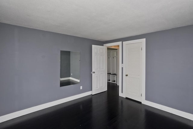 7 Summit Dr, Westfield, MA 01085 - unfurnished room with dark wood-type flooring and baseboards