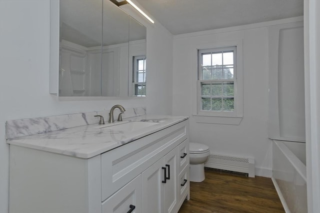7 Summit Dr, Westfield, MA 01085 - full bath with vanity, a baseboard heating unit, and wood finished floors