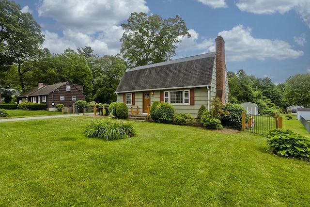 7 Summit Dr, Westfield, MA 01085 - colonial inspired home with roof with shingles, a shed, and a chimney
