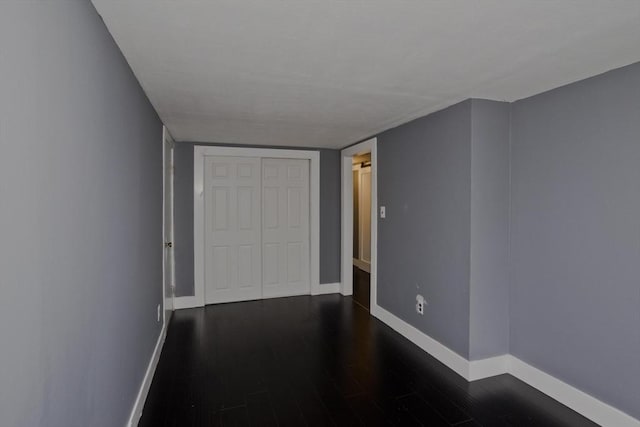 7 Summit Dr, Westfield, MA 01085 - unfurnished bedroom featuring dark wood finished floors and a closet