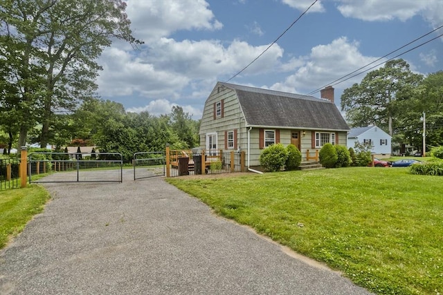 7 Summit Dr, Westfield, MA 01085 - dutch colonial with a gate, a gambrel roof, a shingled roof, a chimney, and driveway