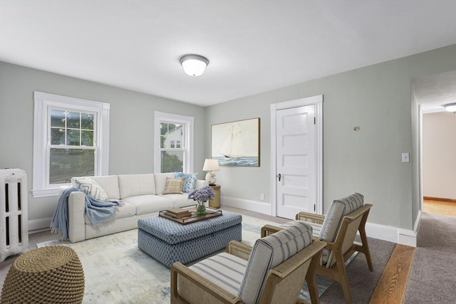 2 Howard St, Braintree, MA 02184 - living area with radiator and baseboards