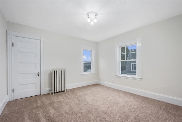 2 Howard St, Braintree, MA 02184 - unfurnished room with radiator heating unit and carpet