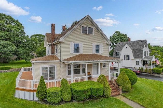 2 Howard St, Braintree, MA 02184 - view of front of house featuring a porch, a front yard, a chimney, a shingled roof, and stairs