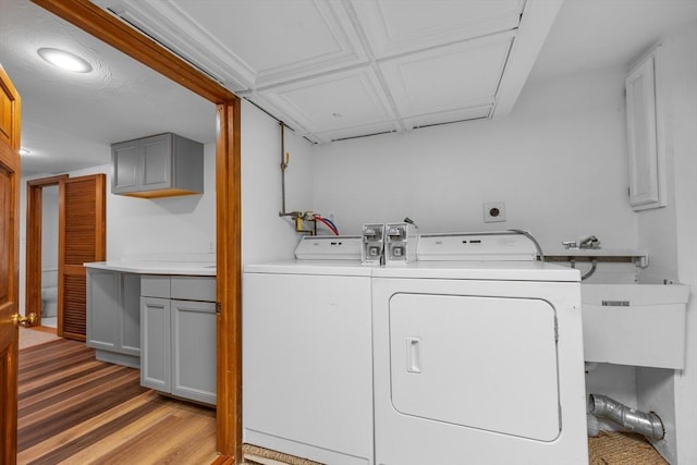 2 Howard St, Braintree, MA 02184 - laundry room featuring cabinet space, washing machine and clothes dryer, wood finished floors, and recessed lighting