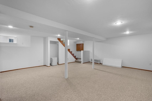2 Howard St, Braintree, MA 02184 - finished basement featuring light carpet, stairway, and recessed lighting