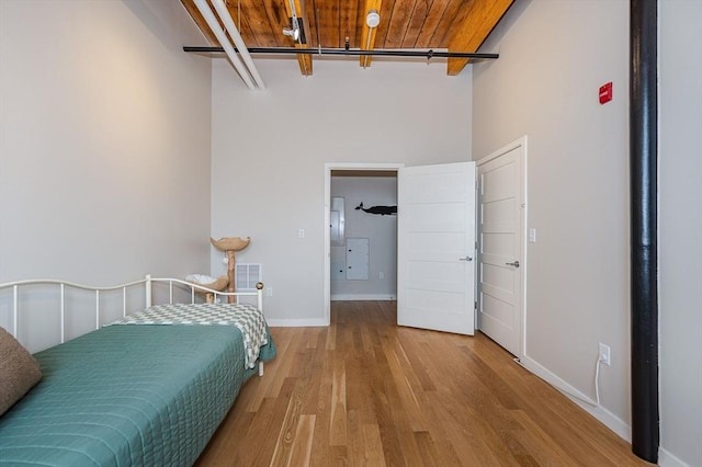 unfurnished bedroom featuring hardwood / wood-style flooring