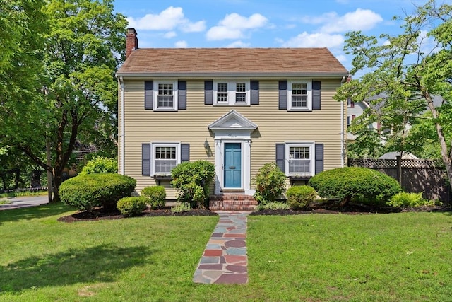 4 Grand St, Reading, MA 01867 - colonial home featuring a chimney