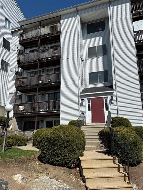 view of building exterior with entry steps