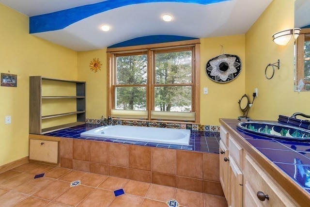 18 W Shore Dr, Goshen, MA 01032 - bathroom with tile patterned flooring, a bath, vanity, and recessed lighting