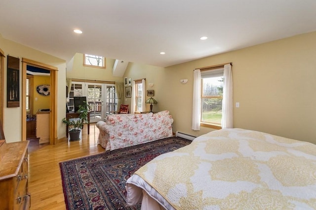 18 W Shore Dr, Goshen, MA 01032 - bedroom with baseboard heating, wood finished floors, and recessed lighting