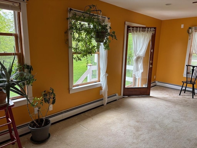 18 W Shore Dr, Goshen, MA 01032 - empty room featuring carpet floors and a baseboard heating unit