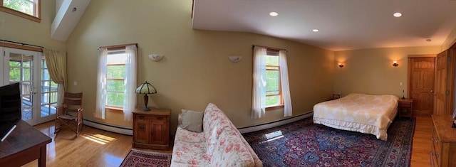 18 W Shore Dr, Goshen, MA 01032 - bedroom featuring a baseboard radiator, wood finished floors, recessed lighting, access to outside, and french doors