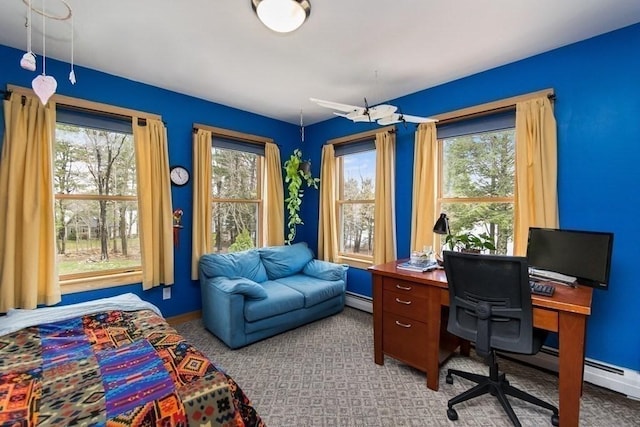 18 W Shore Dr, Goshen, MA 01032 - carpeted office with healthy amount of natural light, a baseboard heating unit, and baseboards