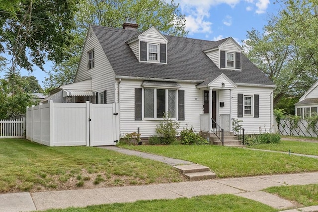 10 Jefferson St, Lawrence, MA 01843 - cape cod-style house with a gate, roof with shingles, and a chimney