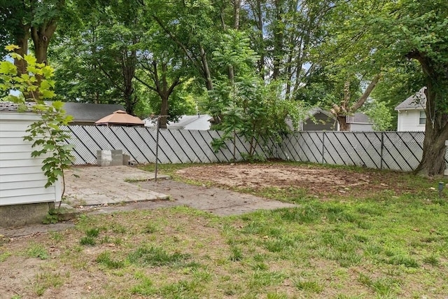 10 Jefferson St, Lawrence, MA 01843 - fenced backyard with a patio