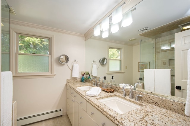 bathroom featuring plenty of natural light, ornamental molding, a baseboard heating unit, and vanity