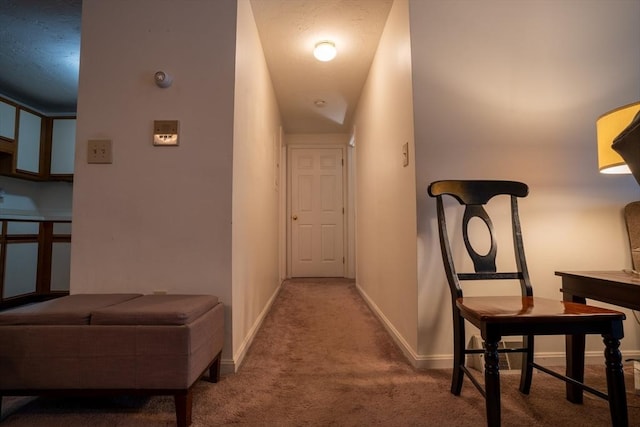 hallway with carpet