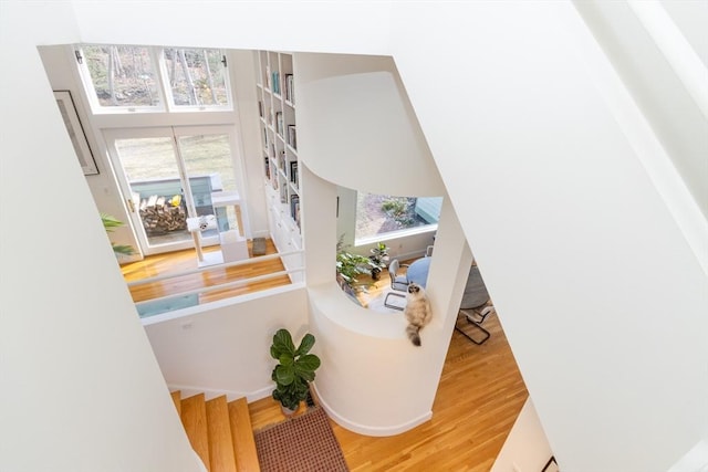 stairs with wood finished floors