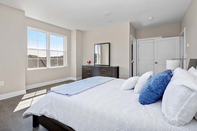 bedroom featuring dark hardwood / wood-style floors