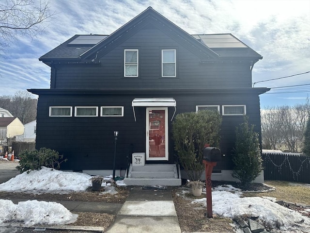 view of front of house with fence