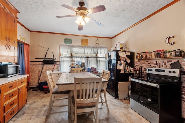 dining room featuring ceiling fan and ornamental molding