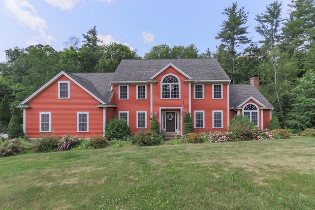 3 Integrity Way, Groton, MA 01450 - colonial-style house with a front yard, a chimney, and roof with shingles