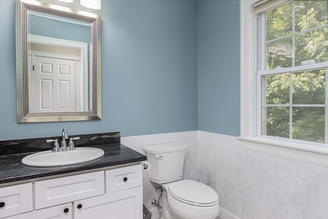 3 Integrity Way, Groton, MA 01450 - bathroom with vanity, plenty of natural light, wainscoting, and tile walls