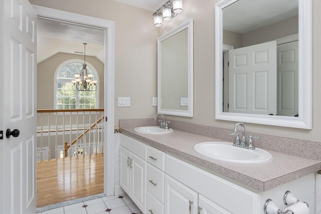 3 Integrity Way, Groton, MA 01450 - bathroom featuring double vanity, a chandelier, lofted ceiling, and tile patterned floors