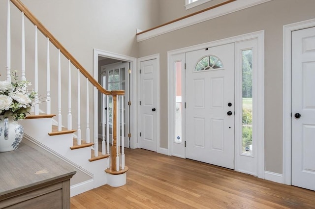 3 Integrity Way, Groton, MA 01450 - foyer entrance with healthy amount of natural light, light wood-style floors, and stairway