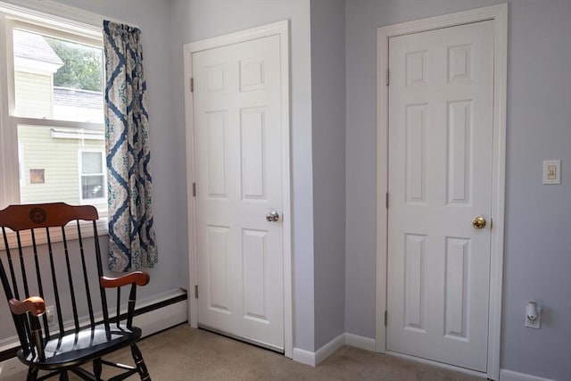 69 Front St, Shirley, MA 01464 - sitting room with light carpet and baseboards