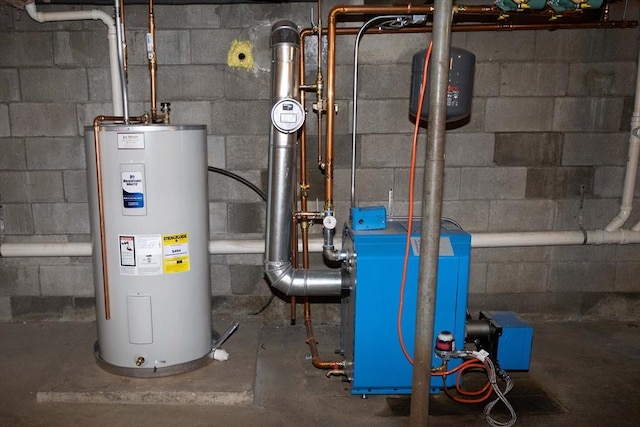 69 Front St, Shirley, MA 01464 - utilities featuring water heater and a heating unit