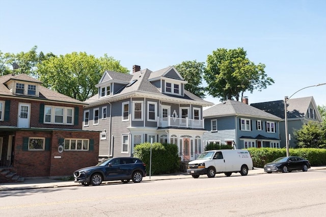 1690 Centre St Unit 2, Boston, MA 02132 - view of front facade with brick siding