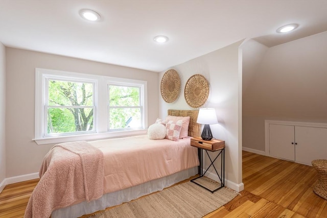 1690 Centre St Unit 2, Boston, MA 02132 - bedroom featuring light wood-style flooring, baseboards, and recessed lighting
