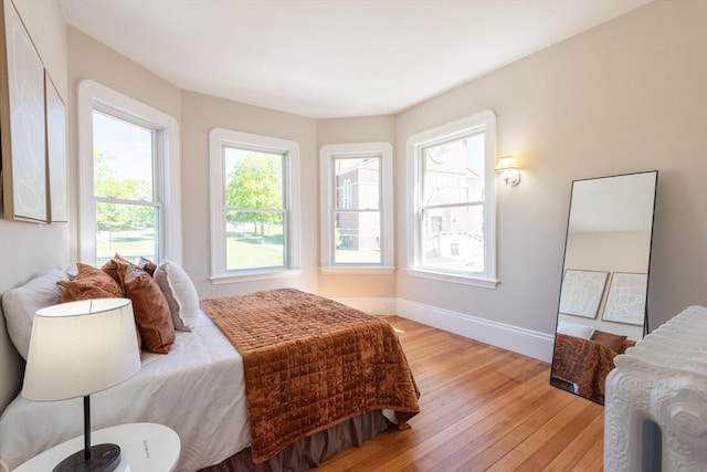 1690 Centre St Unit 2, Boston, MA 02132 - bedroom with light wood finished floors and baseboards