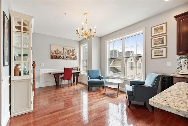 22 Dunia Ln, Northborough, MA 01532 - living area with a chandelier, light wood-style floors, a desk, and baseboards