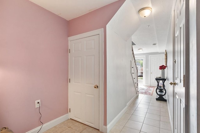 22 Dunia Ln, Northborough, MA 01532 - hallway featuring light tile patterned floors and baseboards