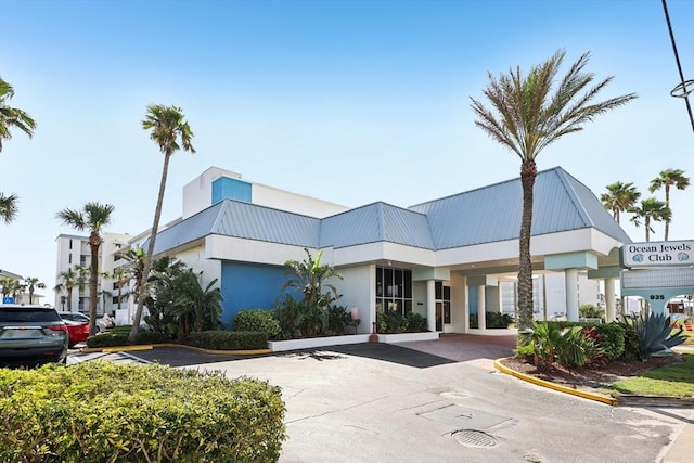 935 S Atlantic Unit 302, Daytona Beach, FL 32118 - view of property with uncovered parking