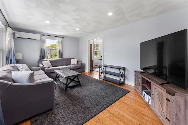 26 Dodge Rd, Sutton, MA 01590 - living room featuring a wall mounted AC, plenty of natural light, light wood-type flooring, recessed lighting, and baseboards