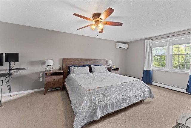 26 Dodge Rd, Sutton, MA 01590 - carpeted bedroom featuring a wall mounted air conditioner, a baseboard radiator, baseboards, and ceiling fan